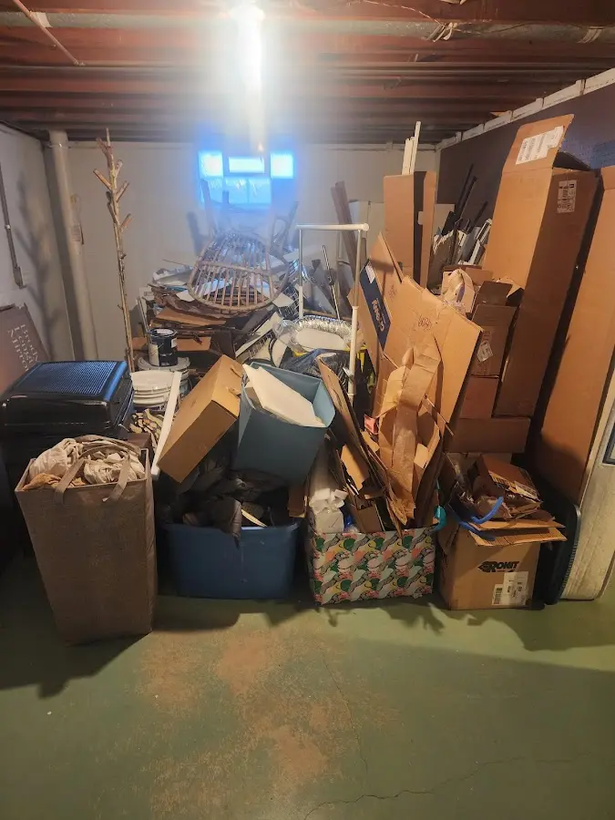 Roll-off dumpster container at job site for 6 Yard Dumpster Rental in Havelock